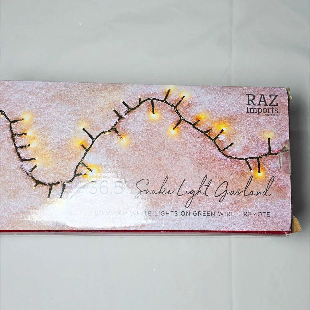 RAZ Imports 36.5' Snake Light Garland 500 Warm White LED, Remote, Green Cord